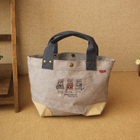 春季新品日本拼色布艺刺绣憨猫手提包便当包日系便携手拎袋
