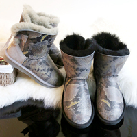 2015冬季新款蛇皮纹羊皮毛一体雪地靴女黑色磨砂蝴蝶结短靴防滑鞋