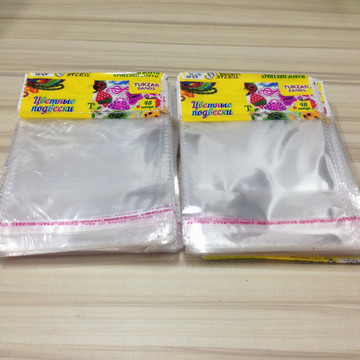 OPP袋子自粘袋批发彩色透明卡头带孔装儿童小皮筋塑料包装促销